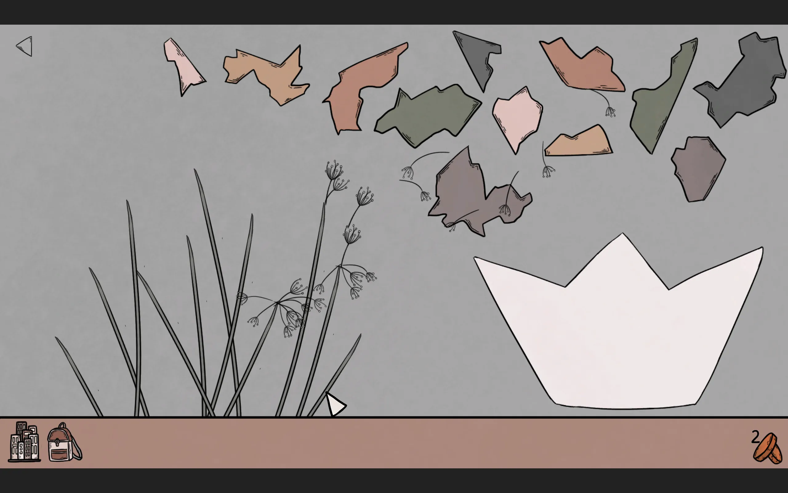 Puzzle pieces hang above a vase
